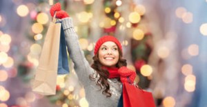 happy-woman-winter-clothes-shopping-bags-holidays-x-mas-sale-people-concept-young-asian-over-christmas-tree-lights-59583118